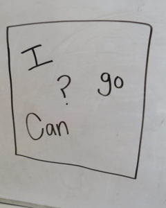 sentence scramblers on a whiteboard