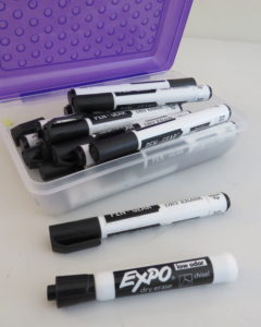 container of dry erase markers