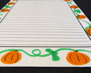 motivate kids to write using markers, pumpkins