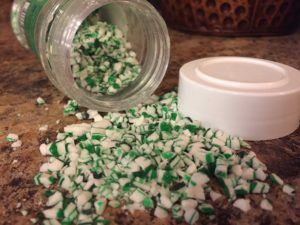 Green mint candies spilled out