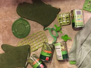 Green kitchen materials out on the floor