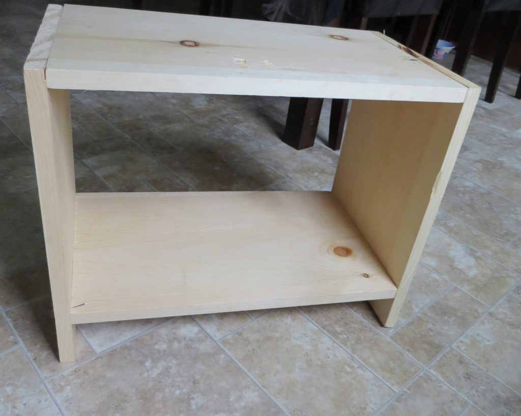 a finished wooden shelf