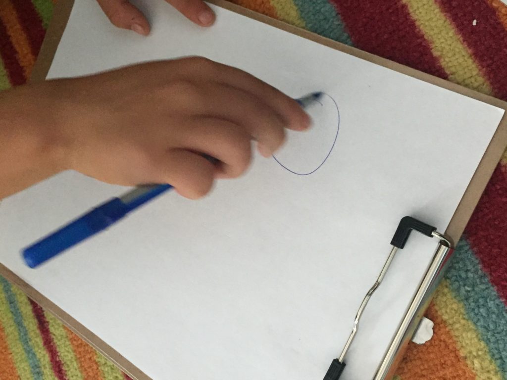 Child writing circles