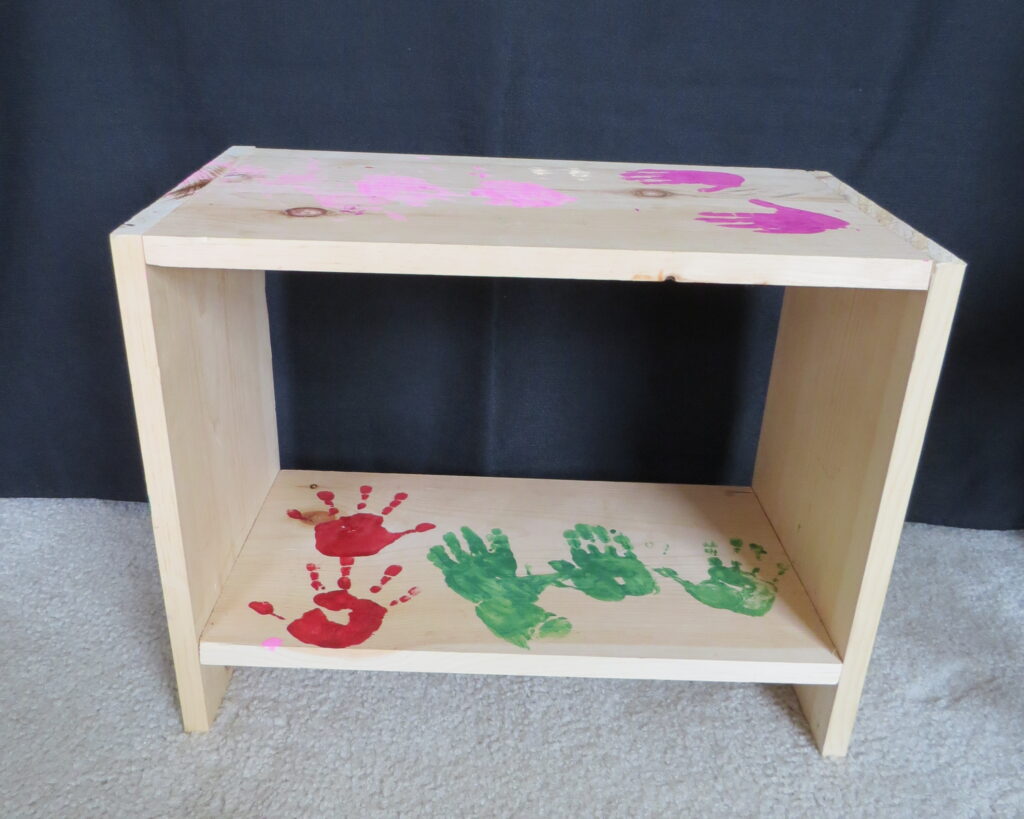 Kids build a 4 tier shelf after building their own simple shelf