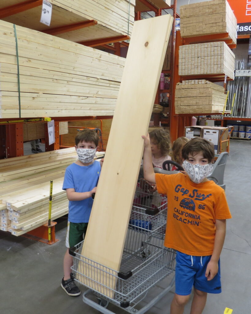 two large pieces of wood needed to build a 4 tier shelf